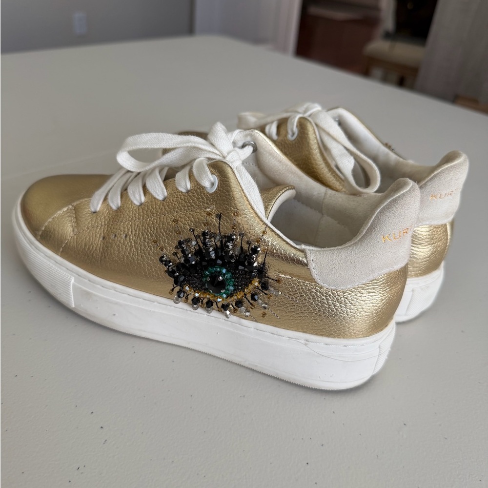 Kurt Geiger Metallic Gold Sneakers with Embellished Eye